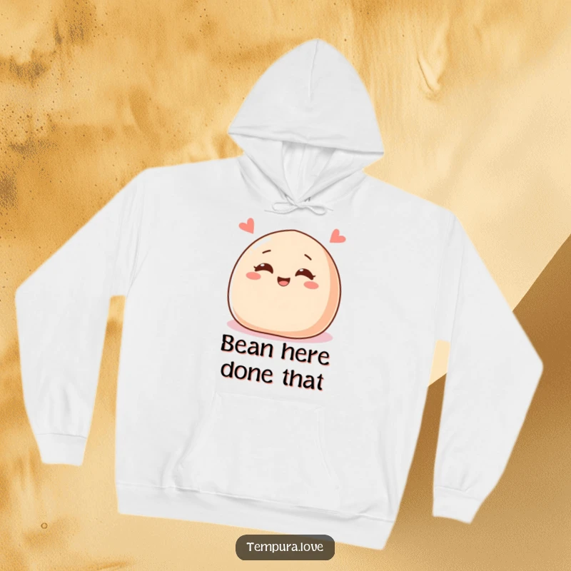 Funny hoodie featuring a delighted sweet red bean paste bun with cheerful eyes, winking, perfect for cozy comfort.