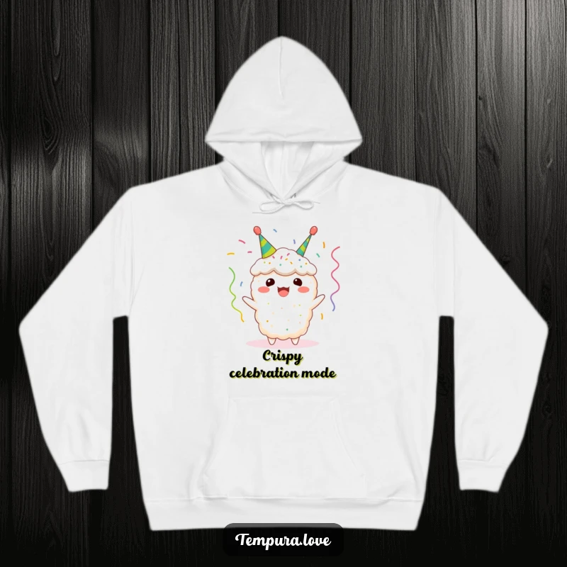 Funny tempura hoodie showcasing a beaming fried shrimp character festooned with miniature celebratory streamers, embodying delicious warmth and joy.