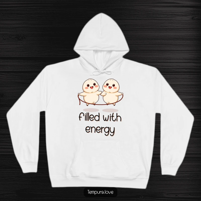 Funny hoodie featuring two adorable dumplings with simple eyes and mouths happily skipping rope, perfect for cozy moments.