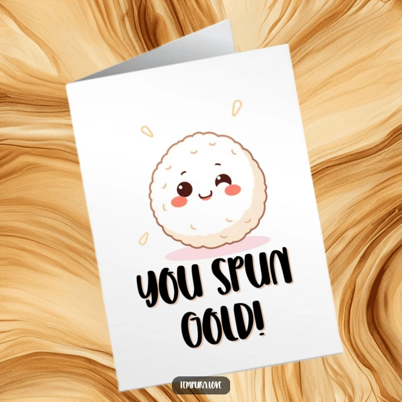 Funny Free Printable Congratulations Card: A smiling Japanese rice ball with cheerful eyes happily spins, radiating positivity.