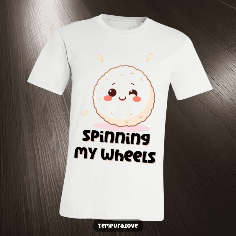 Funny t-shirt with a happy Japanese rice ball character, smiling with joy and spinning merrily, perfect for casual wear.