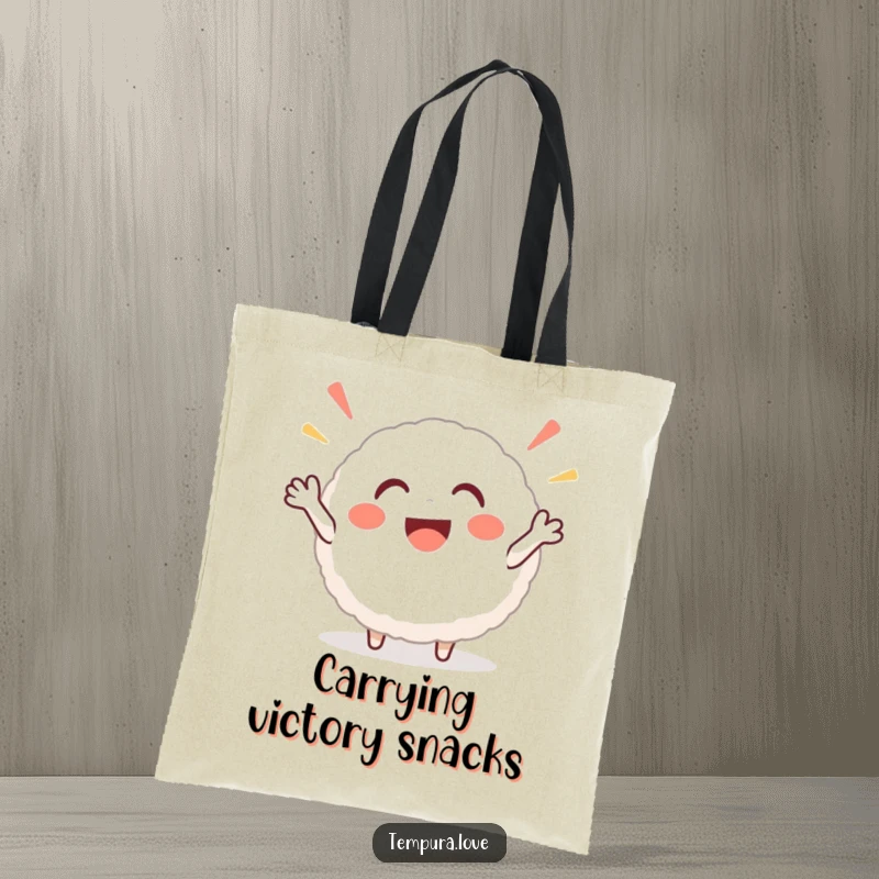 Funny rice ball tote bag with a smiling, round character enthusiastically cheering, ready to carry your essentials with a smile.